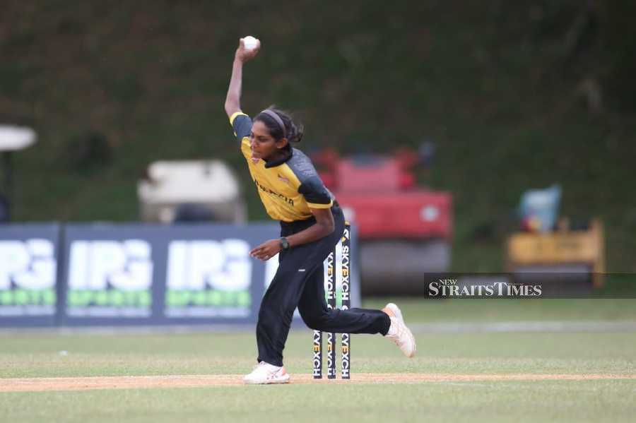 Malaysia’s Winifred Duraisingam bowling against UAE in an ACC Women’s T20 Championship match at the UKM Oval in Bangi yesterday. - Pic Courtesy of Malaysian Cricket Association