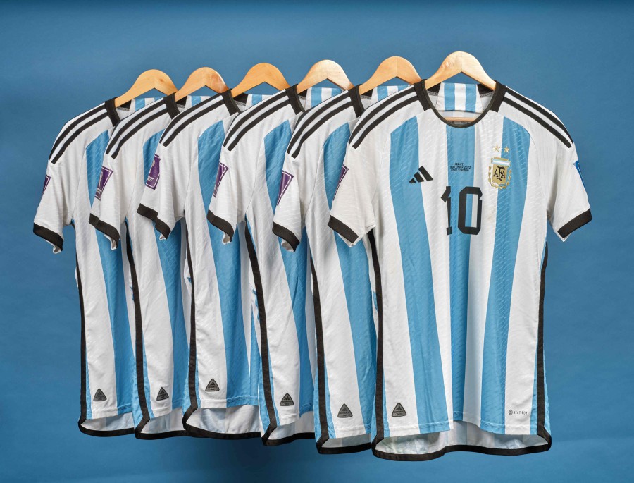 This undated photo courtesy of Sotheby's shows Lionel Messi's set of six match worn shirts from the 2022 FIFA World Cup. - AFP PIC