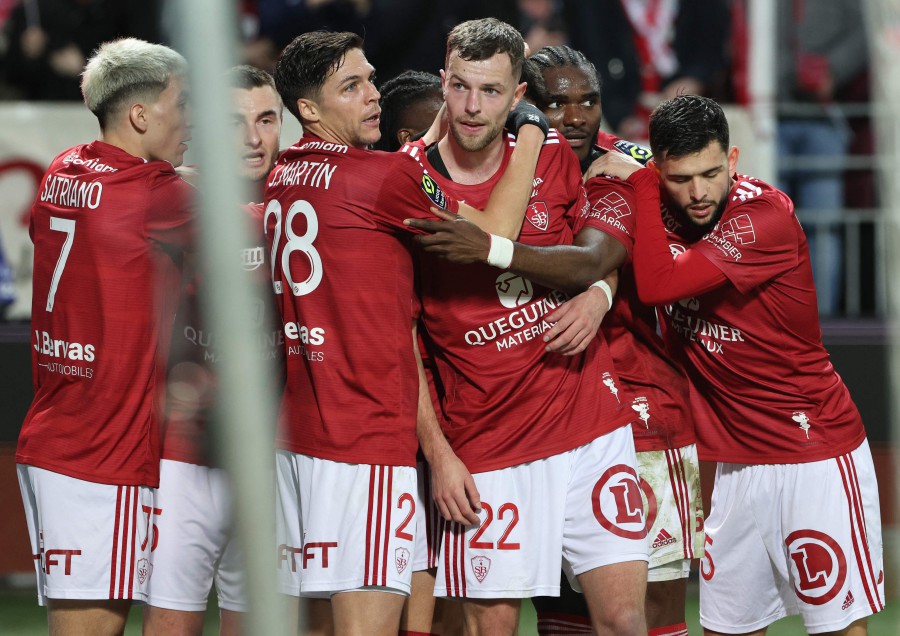 Brest's players celebrate after Pierre Lees-Melou scored his team first goal against Marseille at the Francis-Le Ble stadium in Brest. - AFP PIC