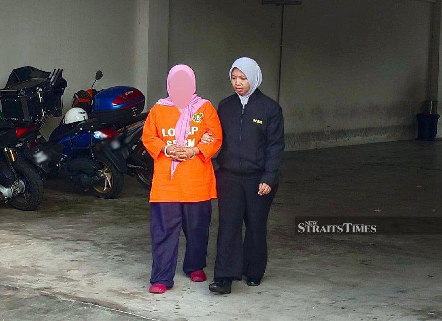 The suspect was arrested on Sunday at 9pm when she turned up at the Kedah MACC office to have her statement recorded. - Pic courtesy of MACC