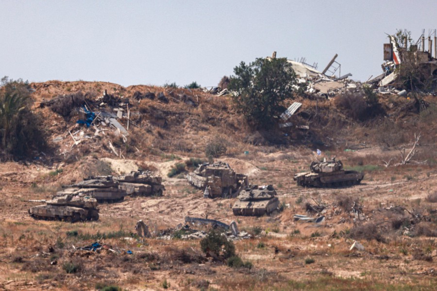 A picture taken from the Israeli border with the Gaza Strip shows Israeli army tanks manoeuvering inside Gaza, on June 4, 2024, amid the ongoing conflict between Israel and Hamas. - AFP PIC
