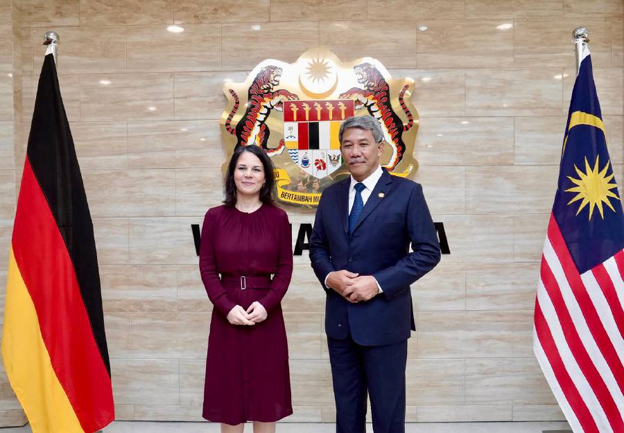 Foreign Minister Datuk Seri Mohamad Hasan with his German counterpart Annalena Baerbock in Perdana Putra. - Pic credit Facebook TokMatHasanN9