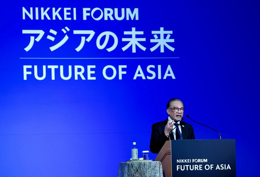 Prime Minister Datuk Seri Anwar Ibrahim delivers his keynote address during the 29th International Conference on the Future of Asia (Nikkei Conference) in Tokyo. - BERNAMA PIC