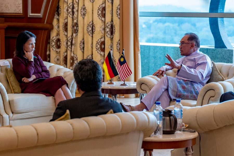 Prime Minister Datuk Seri Anwar Ibrahim speaking to German Foreign Minister Annalena Baerbock in Perdana Putra. Pic credit Facebook anwaribrahimofficial