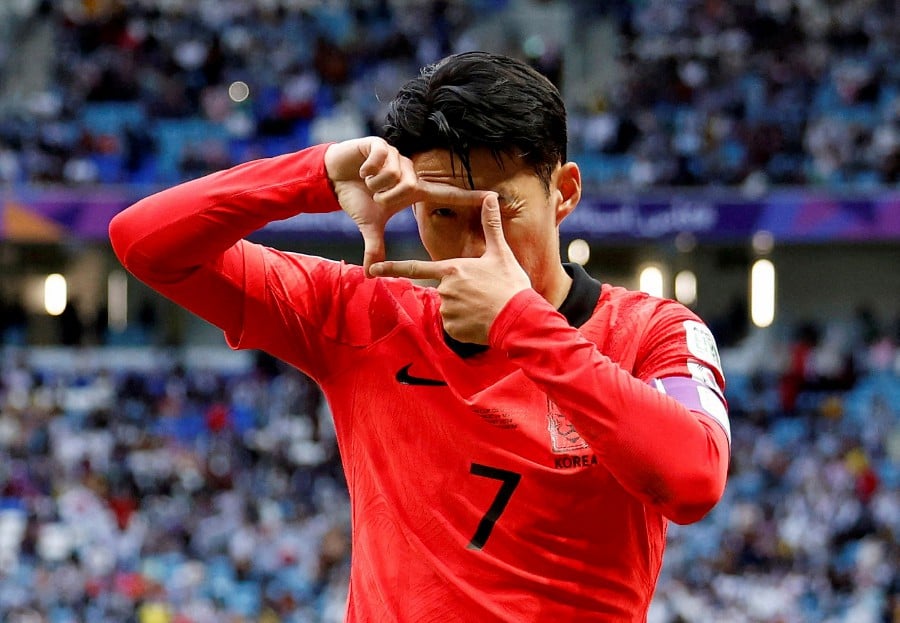 South Korea's Son Heung-Min celebrates scoring their third goal against Malaysia at Al Janoub Stadium, Al Wakrah, Qatar. - REUTERS PIC