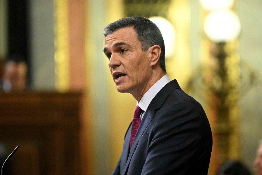 Spain's acting Prime Minister Pedro Sanchez talks during a Parliamentary debate on the eve of a vote to elect Spain's next premier, at the Congress of Deputies in Madrid on November 15, 2023. -- AFP