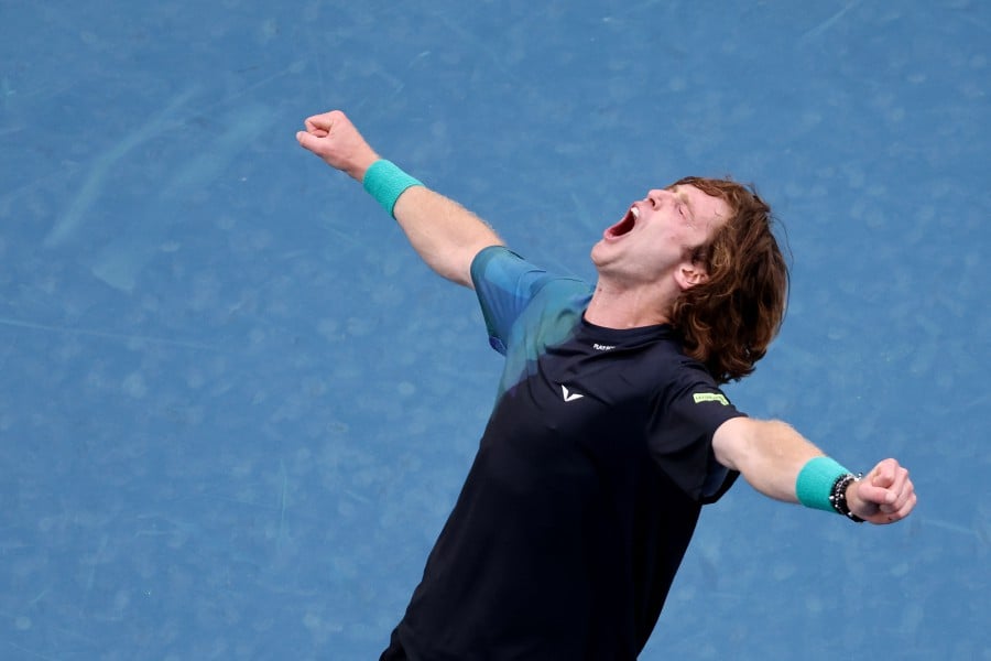Russia's Andrey Rublev celebrates winning against Brazil's Thiago Seyboth Wild during their men's singles match on day one of the Australian Open tennis tournament in Melbourne on Jan 14, 2024. -- Pic: AFP