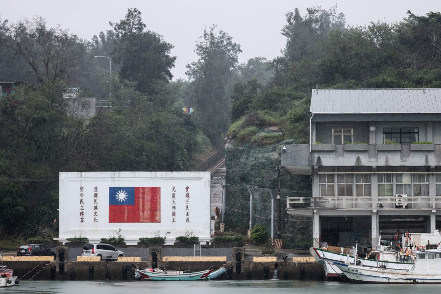The Taiwan flag is seen at a fishing port in Kinmen on May 19, 2024. China on May 23 launched two days of military drills to surround self-ruled Taiwan in what it said was "strong punishment" for the island's "separatist acts". -- AFP