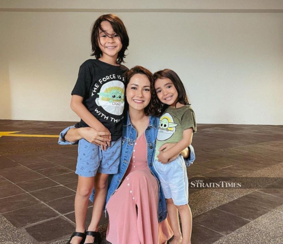 Yasmin Hani with her children Noah and Eissa