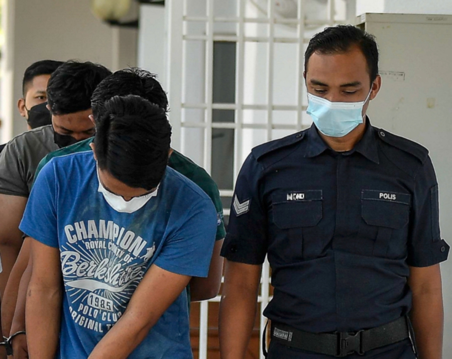 The public has been urged to stop sharing a video showing a youth being bathed like he was a corpse by a group of people after he was caught stealing a mosque’s funds, on social media. - Bernama pic