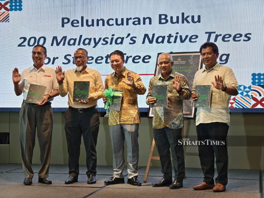 Housing and Local Government Minister Nga Kor Ming during the launch of the '200 Malaysia's Native Trees For Street Planting' book. STR RUWAIDA MD ZAIN 