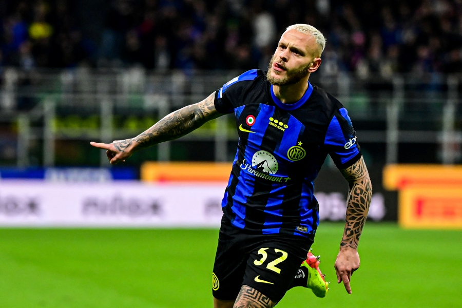 Inter Milan's Italian defender #32 Federico Dimarco celebrates after scoring his team first goal during the Italian Serie A football match between Inter Milan and Empoli in Milan. -AFP/Piero CRUCIATTI