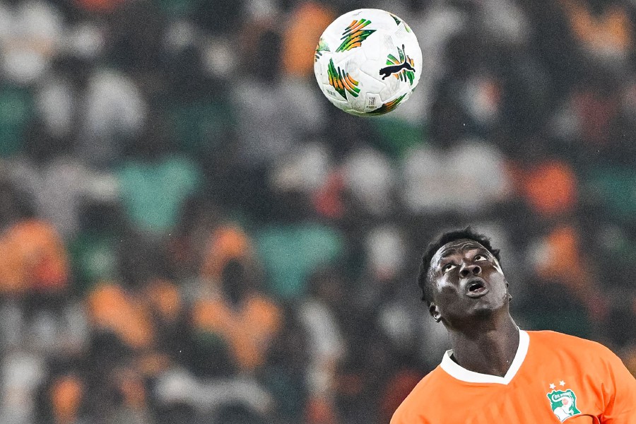 Ivory Coast's forward #14 Oumar Diakite heads the ball during the Africa Cup of Nations 2024 quarter-final football match between Mali and Ivory Coast at the Stade de la Paix in Bouake. -AFP/Issouf SANOGO
