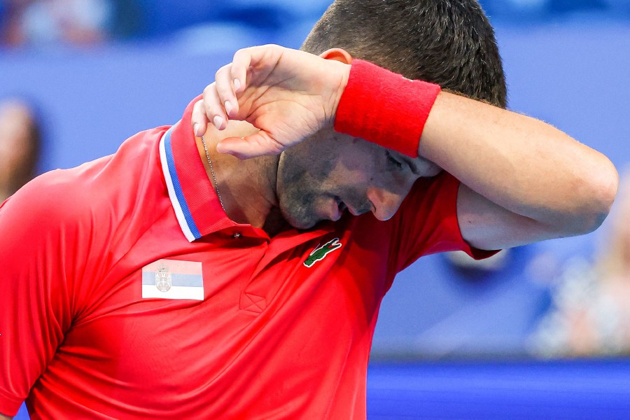 Serbia's Novak Djokovic reacts during his men's singles match against Australia's Alex de Minaur at the United Cup tennis tournament in Perth. -AFP/COLIN MURTY