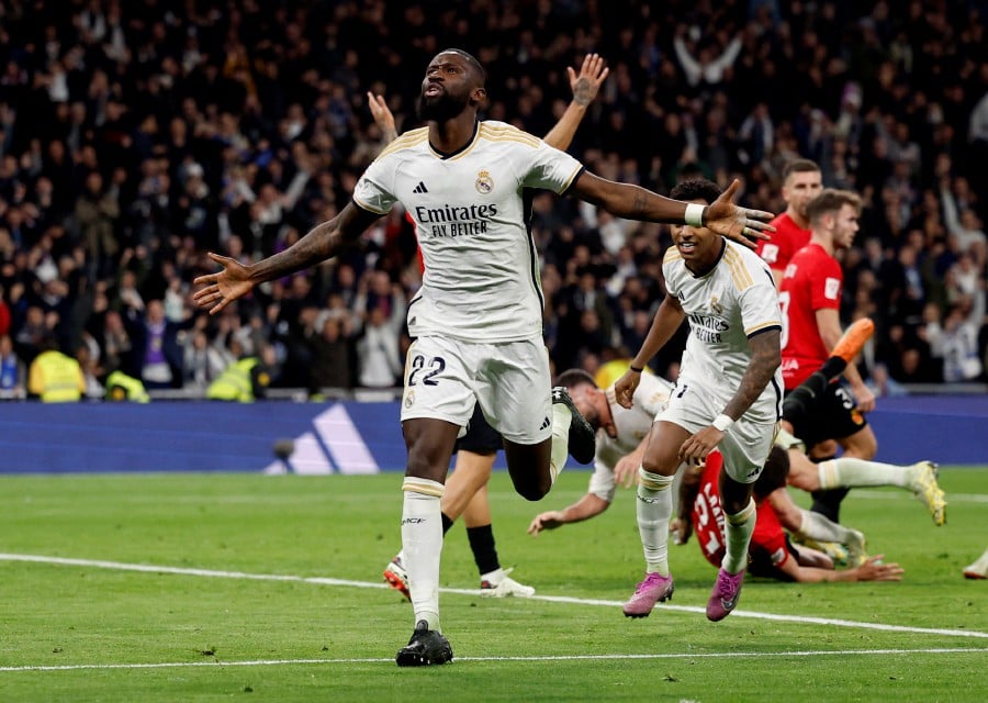 Real Madrid's Antonio Rudiger celebrates scoring their first goal. -REUTERS/Juan Medina