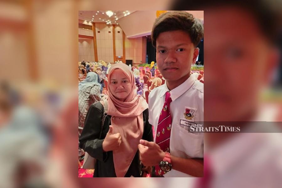 Norazura Ahmad thanked the Association of Wives and Women Members of the Malaysian Civil Service (Puspanita) for assisting her 15-year-old son, Mohd Syafiq Shahidan, through its 'Back to School’ initiative, which was organised in collaboration with the Kedah State Secretary. -NSTP/AHMAD MUKHSEIN MUKHTAR