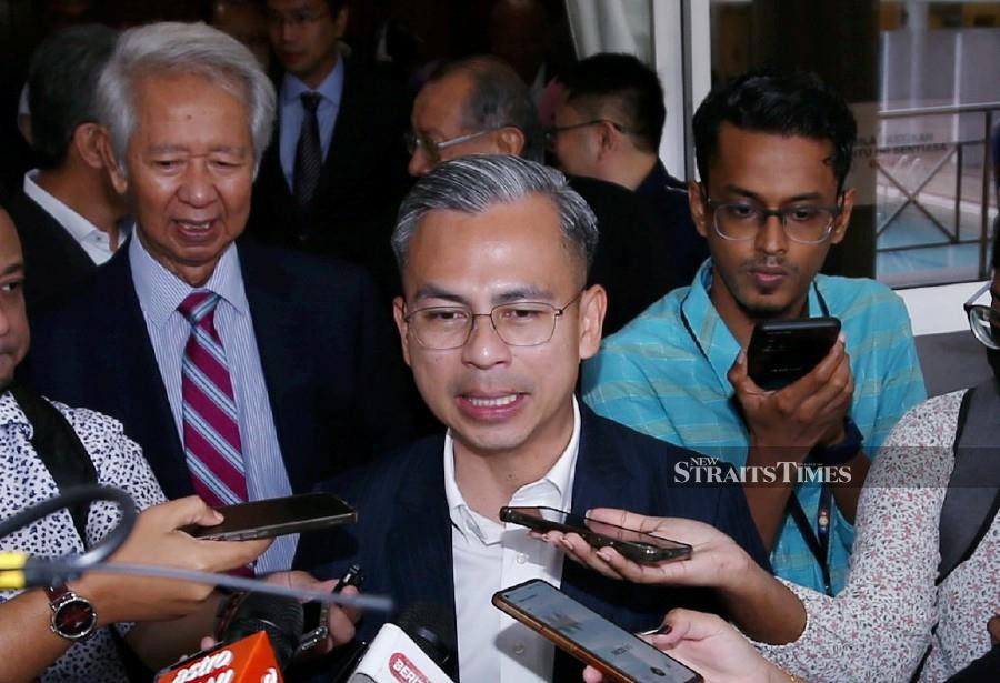 Despite the recent surge in new cases, Communications and Digital Minister Fahmi Fadzil assured that the country's Covid-19 situation is still under control, and that they are awaiting further directives from the Health Ministry on the development. -NSTP/EIZAIRI SHAMSUDIN