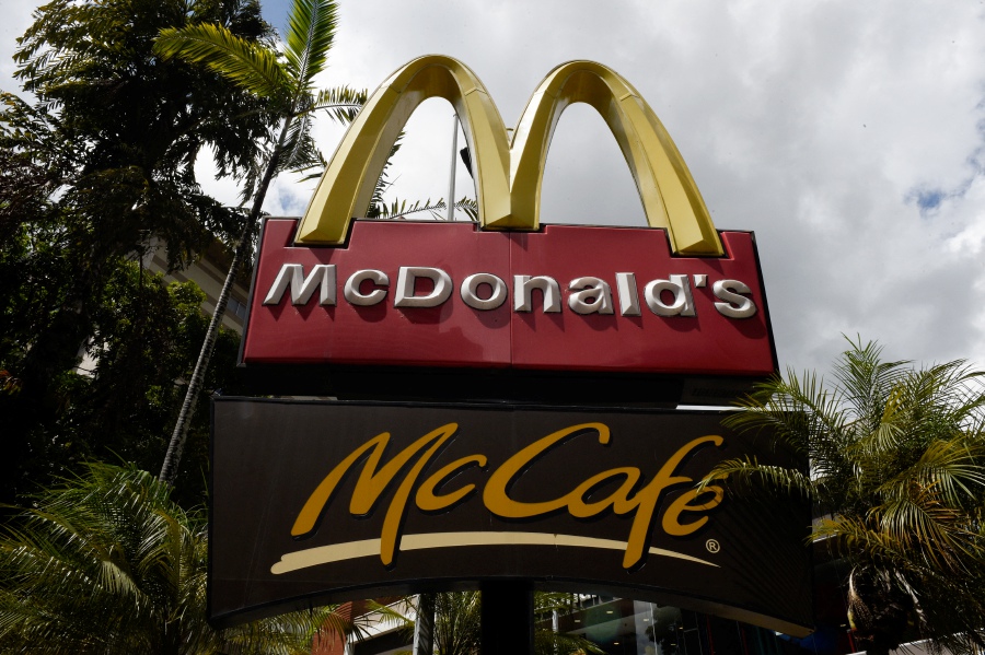 (FILE PHOTO) Picture of the logo of US food chain McDonald's. A total of 21,000 McDonald's Malaysia employees are labelled as supporters of the Jews and subjected to various insults and criticisms following a boycott campaign against the fast-food chain. McDonald's has provided counselling for affected employees. -AFP/Federico PARRA