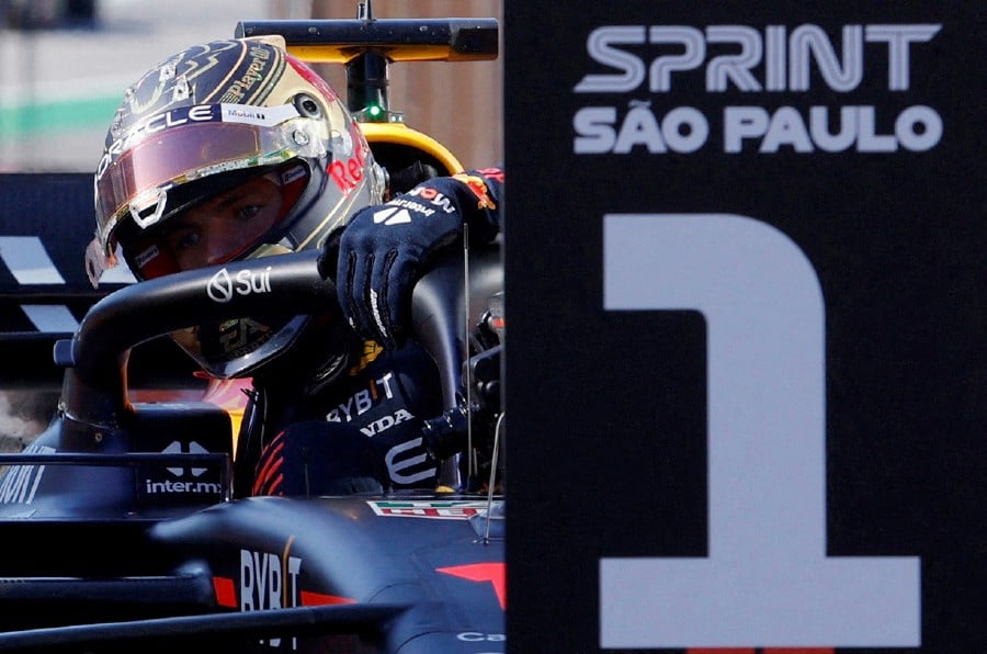 Red Bull's Max Verstappen celebrates after winning the sprint race. -REUTERS/Amanda Perobelli