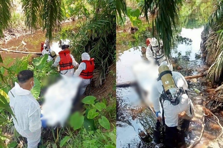 An unidentified and decomposed body was found in a stream in Batu 3½ Jalan Maharajalela. -PIC COURTESY FIRE AND RESCUE DEPT
