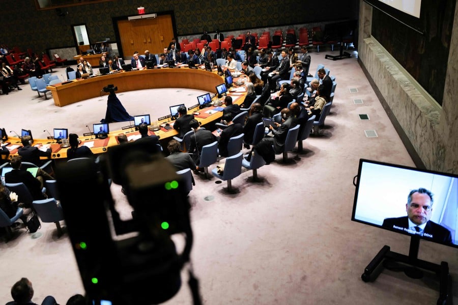 UN Office for the Coordination of Humanitarian Affairs, Ramesh Rajasingham (on screen), speaks during a UN Security Council emergency meeting on the risk of famine and attacks on humanitarian workers in Gaza, at UN headquarters in New York on April 5, 2024. AFP FILE PIC