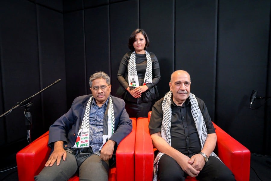 Ambassador of the State Of Palestine to Malaysia, Walid Abu Ali (right) with New Straits Times Operative Editor, Azman Abdul Halim (left) and New Straits Times Assistant News Editor, Amalina Kamal during Beyond The Headlines Recording EP30. -NSTP/RAIHANA MANSOR