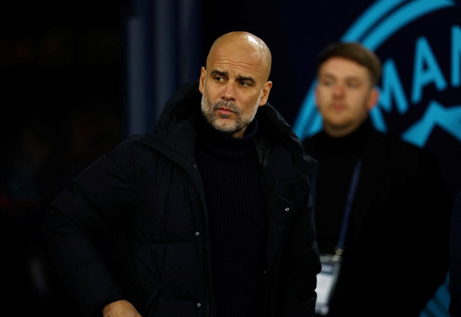 (FILE PHOTO) Manchester City manager Pep Guardiola before a match. -REUTERS/Molly Darlington