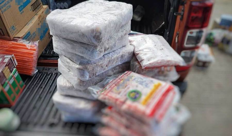 Kedah Maqis (Malaysian Quarantine and Inspection Services Department) foiled attempt to smuggle pork meat and sausages. -PIC COURTESY OF MAQIS