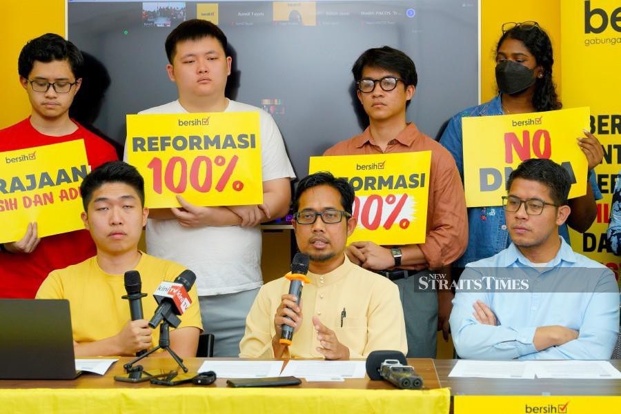 Bersih chairman Muhammad Faisal Abdul Aziz (sitting, centre) said they are ready to hold a demonstration to urge the government to implement its reform agendas as promised. -NSTP/AIMAN FARHAN