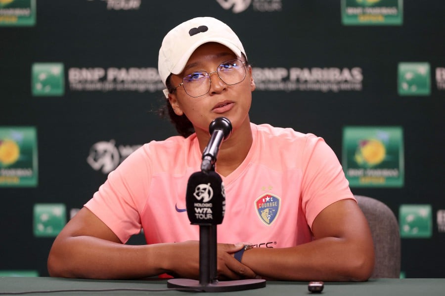 Naomi Osaka of Japan fields questions from the media during the Eisenhower Cup at Indian Wells Tennis Garden in Indian Wells, California. -AFP/MATTHEW STOCKMAN