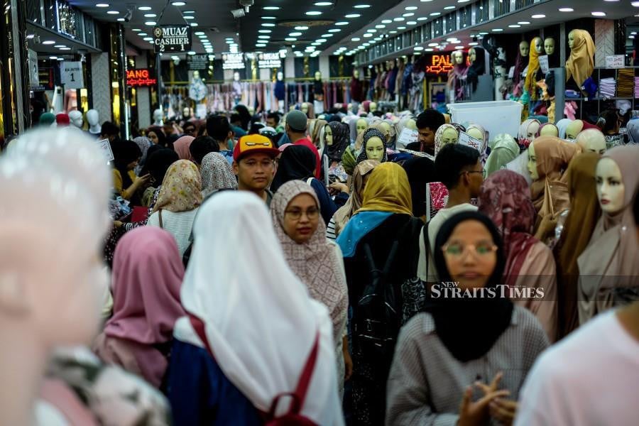 The final weekend before Hari Raya has been a boon for traders in Jalan Tunku Abdul Rahman as last-minute shoppers turn to the iconic spot for quick deals and promotions. -NSTP/HAZREEN MOHAMAD