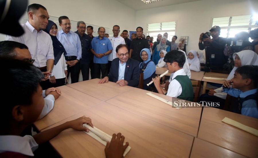 Prime Minister Datuk Seri Anwar Ibrahim wants the Education and Higher Education Ministries to put more emphasis on improving the country’s education standards. -NSTP/HAIRUL ANUAR RAHIM