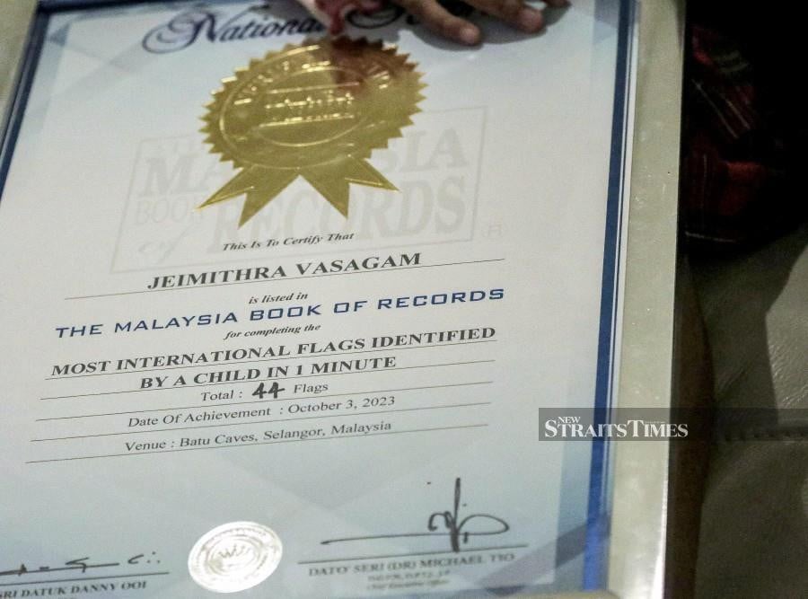 Jeimithra’s world record certificate for identifying and reciting flags of countries. -NSTP/SADIQ SANI