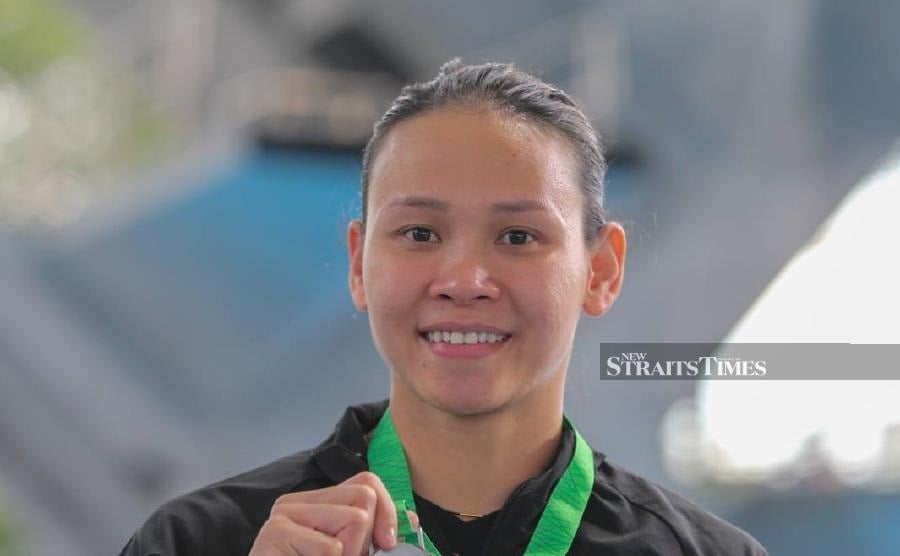 The National Sports Council (NSC) will leave it to the Road to Gold (RTG) committee to decide national diver Pandelela Rinong's status in the RTG programme. -NSTP FILE/ASWADI ALIAS