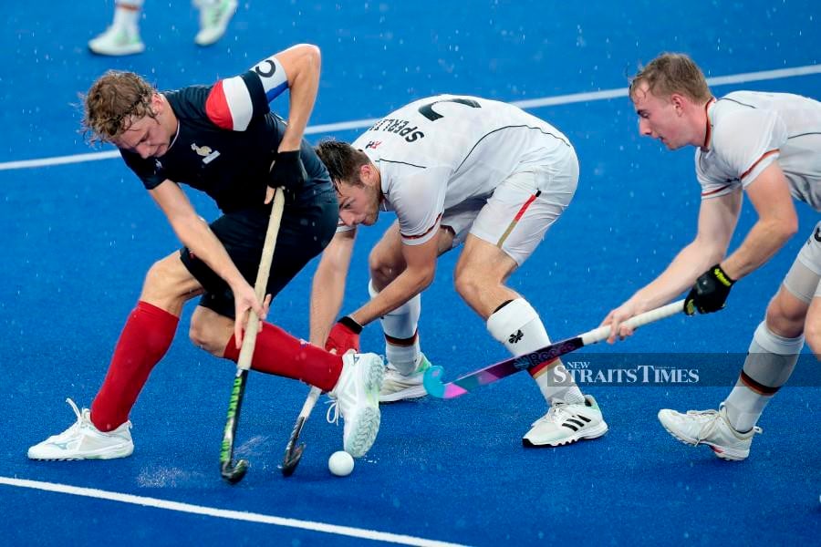 Florian Sperling (centre) is fast becoming the most feared forward in international hockey. The 20-year-old German played a pivotal role by scoring two goals in his team’s 10-0 thrashing of Egypt in a Junior World Cup (JWC) Group B match at National Hockey Stadium, Bukit Jalil. -NSTP/AIZUDDIN SAAD
