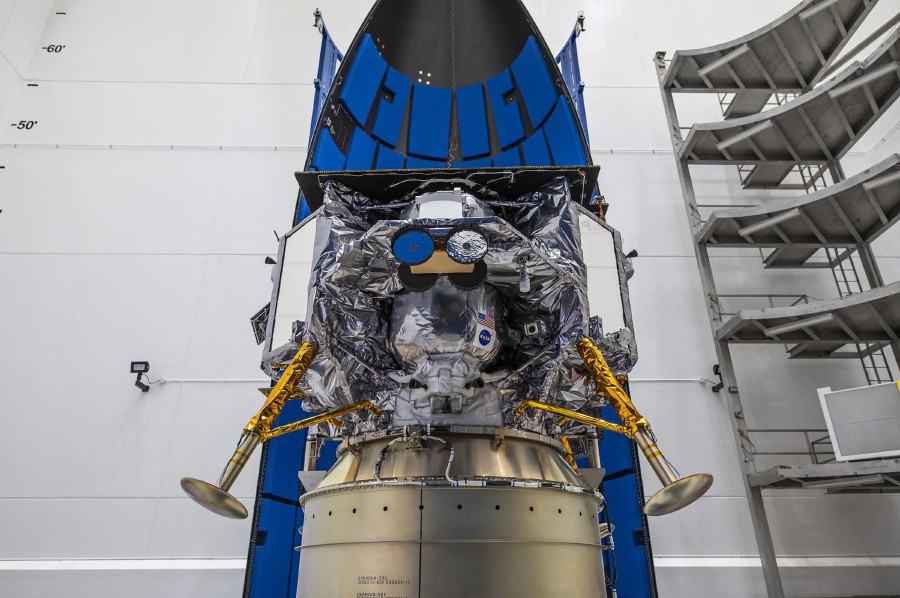 (FILE PHOTO) This image released by NASA shows Astrobotic's Peregrine lunar lander being encapsulated in the payload fairing, or nose cone, of United Launch Alliance's Vulcan rocket on November 21, 2023, at Astrotech Space Operations Facility near the agency's Kennedy Space Center in Florida. The first US lunar lander launched in more than five decades has experienced an anomaly preventing it from pointing its solar panels towards the Sun, the company that built the robot said January 8, 2024. -AFP/HANDOUT/NASA