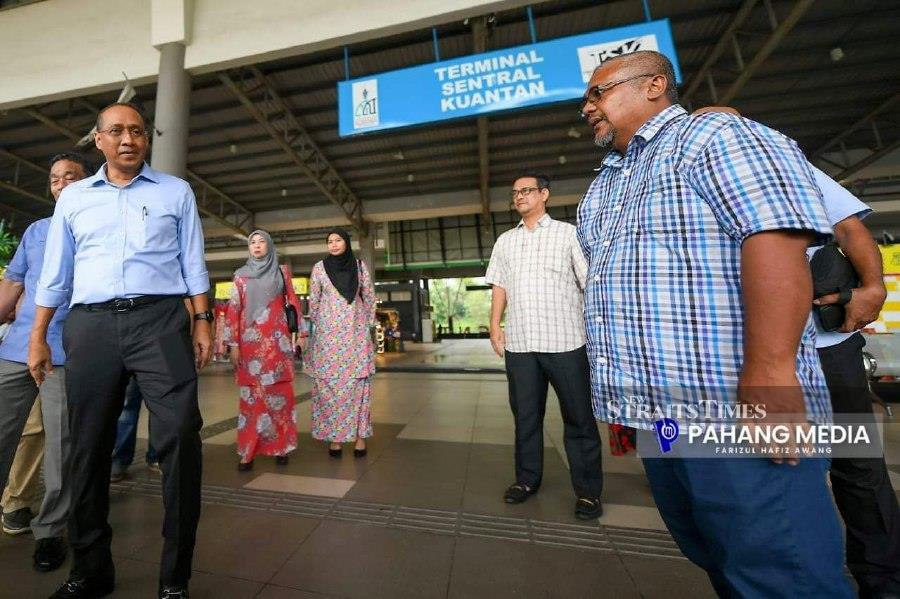 State Public Works, Transport and Health Committee chairman Datuk Mohammad Fakhruddin Mohd Ariff (left) visiting Terminal Sentral Kuantan. -PIC COURTESY OF PAHANG MEDIA