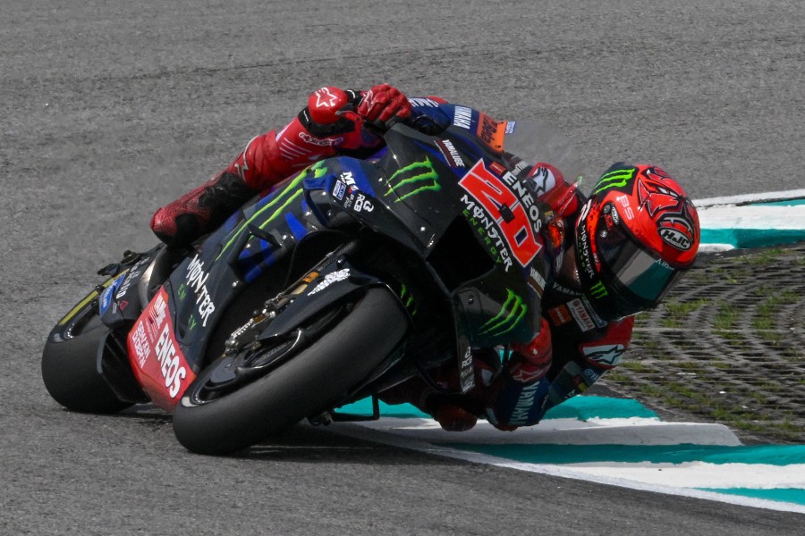 Monster Energy Yamaha’s French rider Fabio Quartararo takes a corner during the first practice session of the MotoGP Malaysian Grand Prix at the Sepang International Circuit in Sepang on November 10, 2023. -AFP/Mohd RASFAN