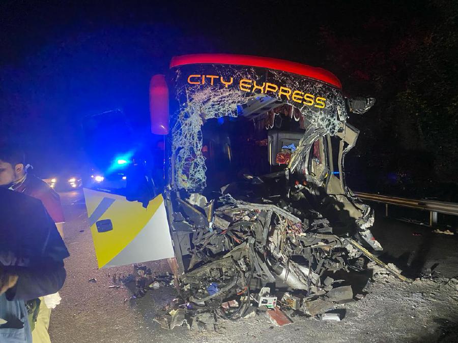 The driver of the express bus, Zulkarnain Jalil, 41, who was pinned to his seat, died at the scene. -PIC COURTESY OF PDRM