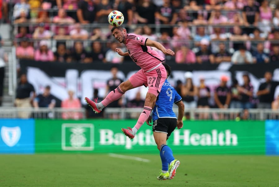 Serhiy Kryvtsov #27 of Inter Miami heads the ball during the second half against CF Montréal at DRV PNK Stadium in Fort Lauderdale, Florida. -AFP/Megan Briggs