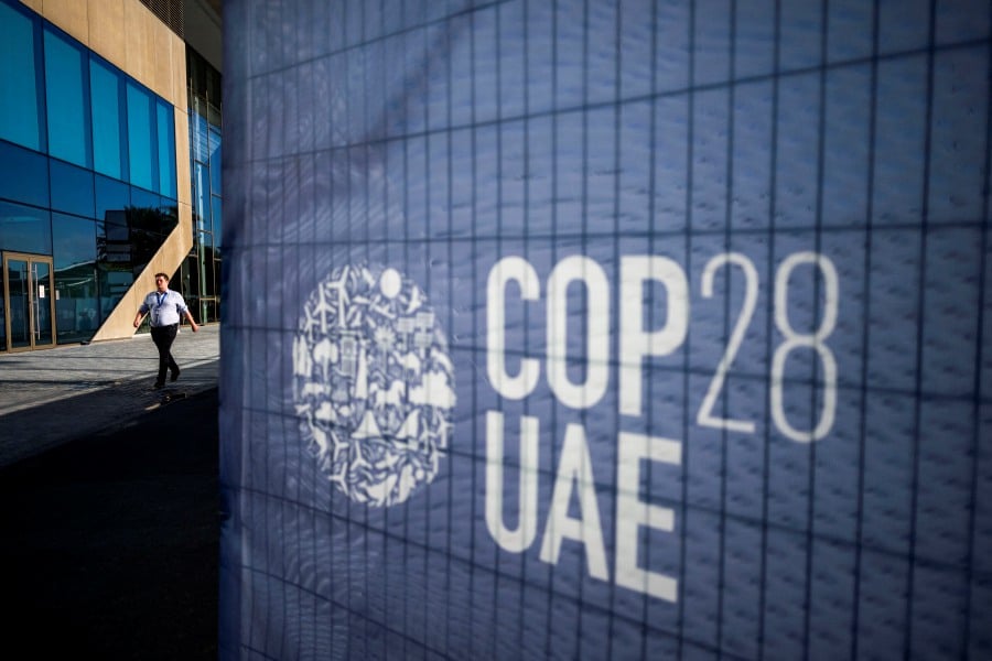 The UN climate conference opens in Dubai with nations under pressure to increase the urgency of action on global warming and wean off fossil fuels. -AFP/Jewel SAMAD