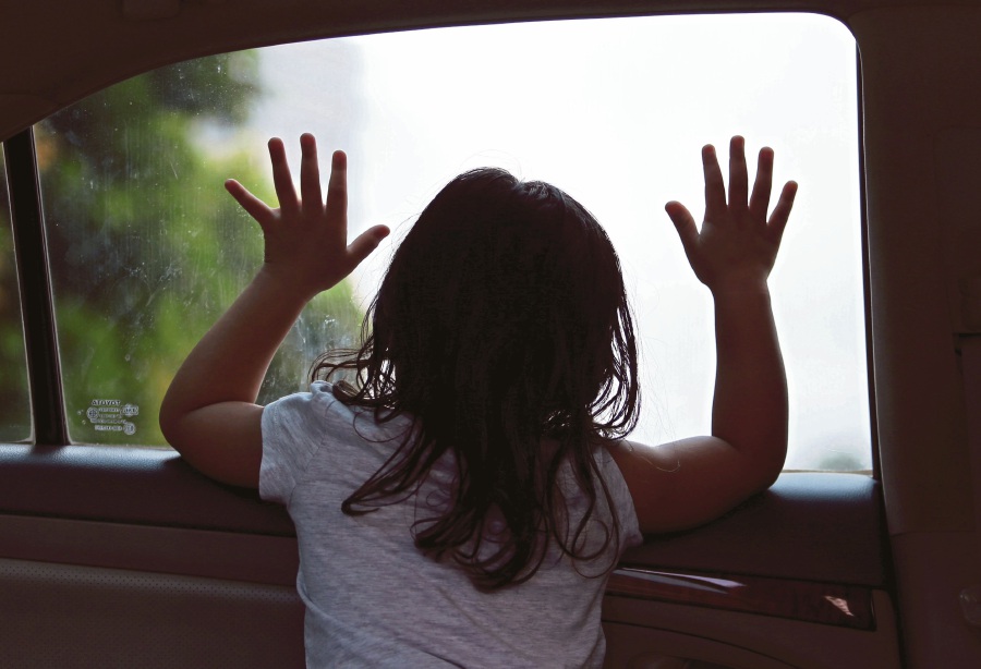 Children can get trapped in heated cars as they are unable to get themselves out of a car the way adults can. -FILE PIC