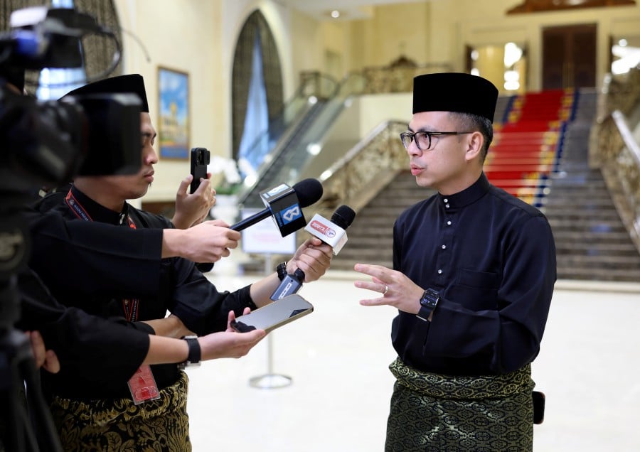 Communications Minister Fahmi Fadzil after the ceremony of taking the oath of office, loyalty and secrecy as well as the presentation of appointment letter at Istana Negara. -BERNAMA PIC