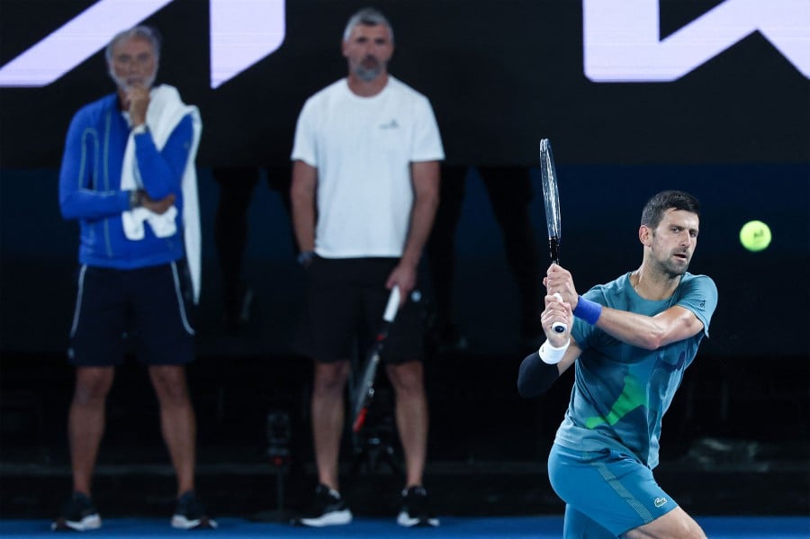 Serbia's Novak Djokovic attends a practice session in Melbourne on January 13, 2024 ahead of the Australian Open tennis championship starting on January 14. -AFP/DAVID GRAY