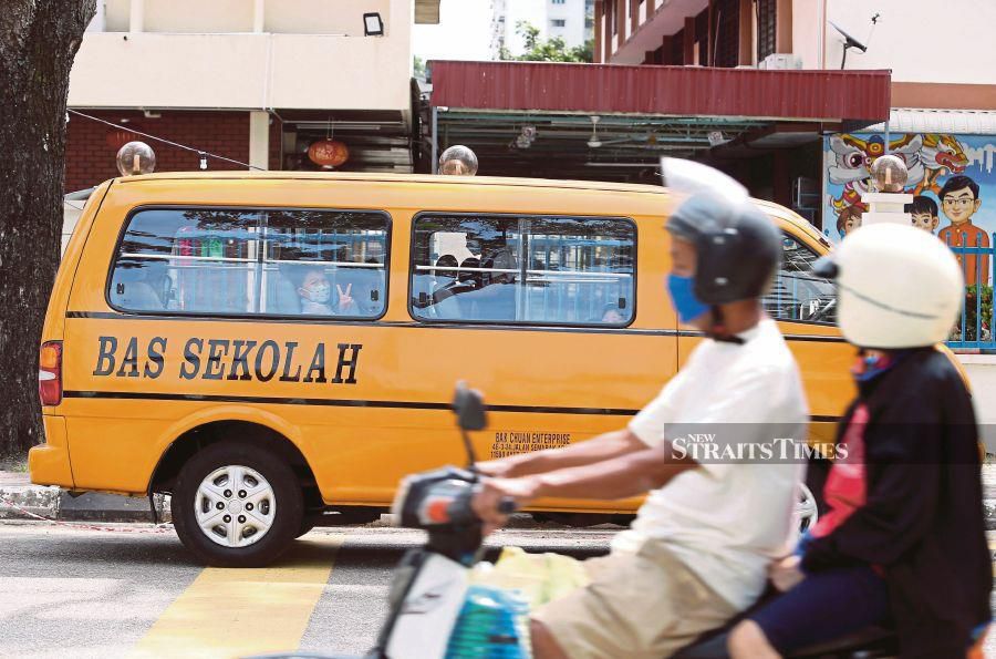 (FILE PHOTO) The Federation of School Bus Associations Malaysia has warned parents of possible fare hike when schools reopen in March. -NSTP FILE/MIKAIL ONG