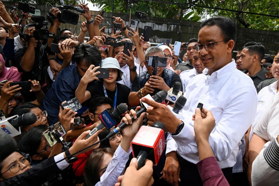 (FILE PHOTO) Presidential candidate Anies Baswedan delivers a statement to the media after quick count results of the general election, in Jakarta, Indonesia. -REUTERS/INDONESIA OUT/ADITYA PRADANA PUTRA
