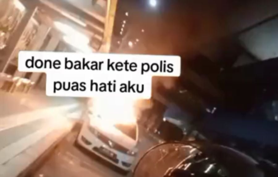 Screenshot from a video purportedly showing an auxiliary police vehicle on fire. -SOURCE: TIKTOK