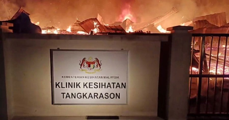Tangkarason health clinic in Beluran was destroyed by fire on Wednesday. -PIC COURTESY OF SABAH COMMUNITY DEVELOPMENT AND PEOPLE’S WELLBEING MINISTRY
