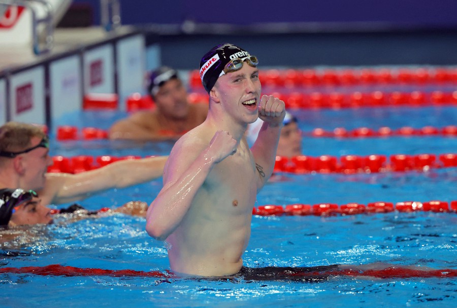Ireland's Daniel Wiffen celebrates winning the men 800m freestyle final. -REUTERS/Evgenia Novozhenina