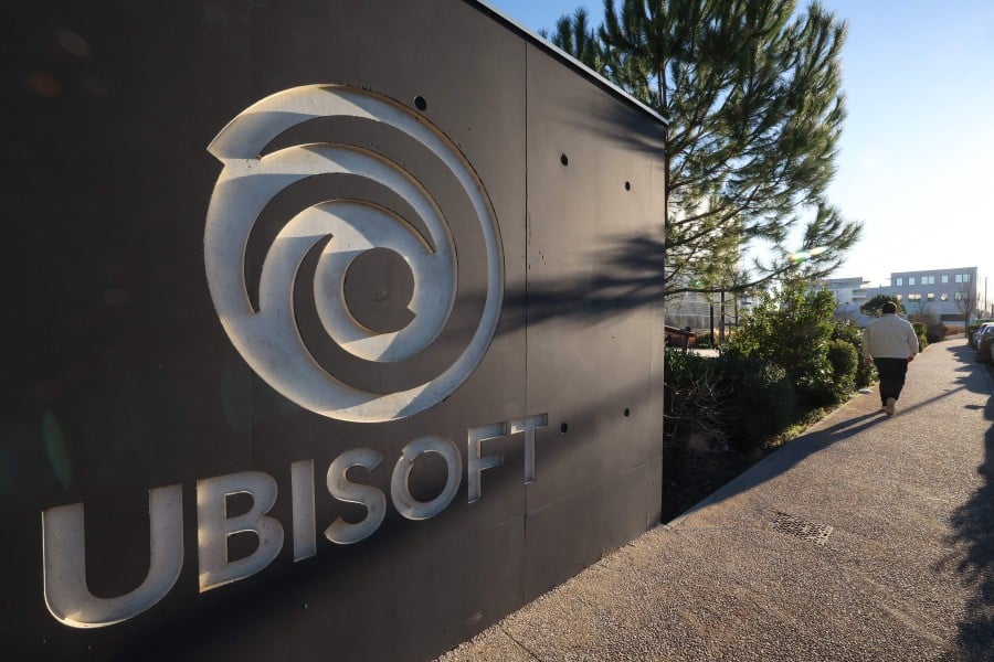 A man passes by the main entrance of Ubisoft video firm. After years of production headwinds, Ubisoft’s oft-delayed pirate video game “Skull and Bones” is set to launch on Friday. -AFP/Pascal GUYOT